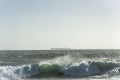 Scenic view of sea against clear sky