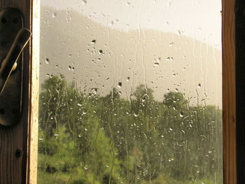 Full frame shot of raindrops on glass window