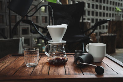 Barista dripping coffee and slow coffee bar style