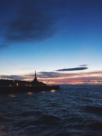 Scenic view of sea against sky at sunset