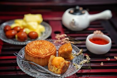 Close-up of fruits in plate on table