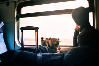 Man sitting in train