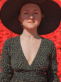 Portrait of a young woman wearing hat