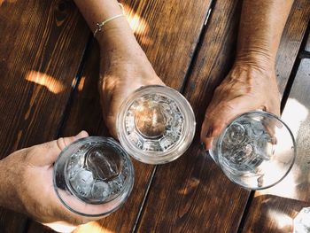High angle view of man preparing food on table