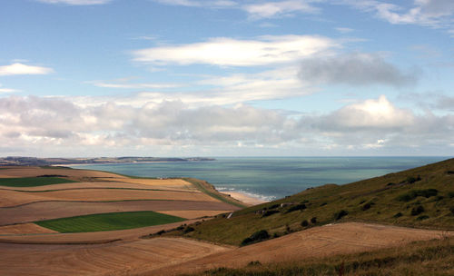 Scenic view of beach against sky