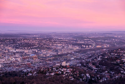 Aerial view of city at sunset