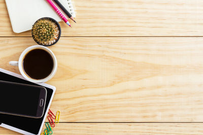 High angle view of coffee cup on table