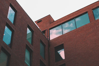 Low angle view of modern building against sky