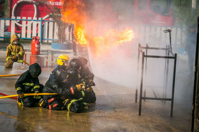 Group of people against fire