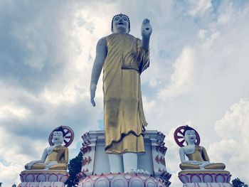 Low angle view of statue against sky