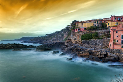 View of sea against buildings