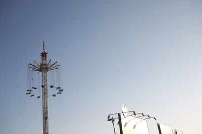 Low angle view of floodlight against clear sky