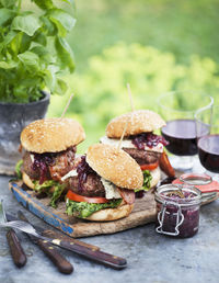 Homemade burgers on table