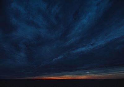 Scenic view of dramatic sky at night