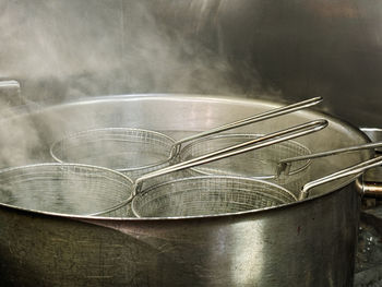 Cropped hand of man preparing food