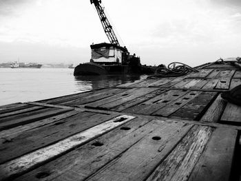 View of wooden pier in harbor