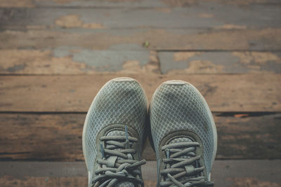 Low section of person wearing shoes