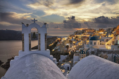 Panoramic view of buildings against sky during sunset