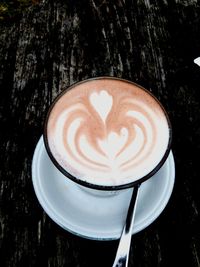 Close-up of cappuccino on table