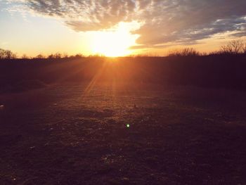 Scenic view of landscape at sunset