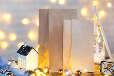 Close-up of illuminated christmas lights on table