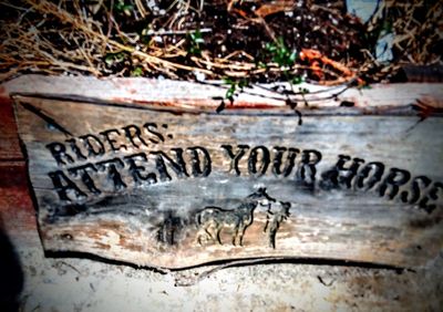 High angle view of text on old wood