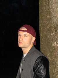 Portrait of young man standing outdoors