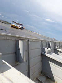 Low angle view of abandoned building against sky