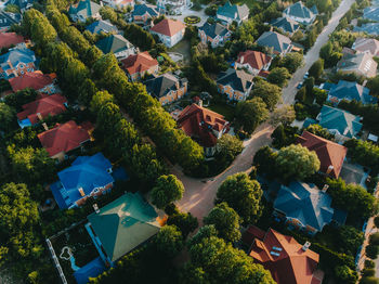 High angle view of townscape and trees in town