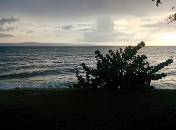 Scenic view of sea against sky at sunset