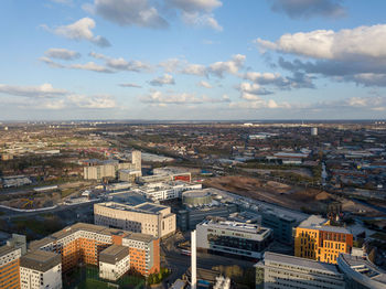 Aerial view of millenium point in birmingham on bright cloudy spring day