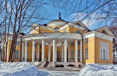 Building against sky during winter