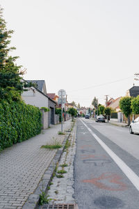 Empty road against clear sky
