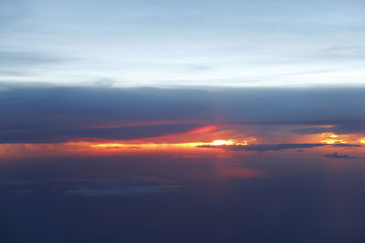 Scenic view of dramatic sky during sunset