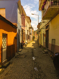 Narrow alley along buildings