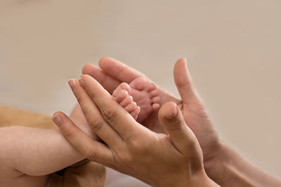 Newborn baby feet. motherhood concept. mother day. copy space. selective focus