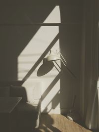 Close-up of shadow on staircase at home