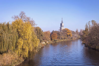 River amidst trees during autumn