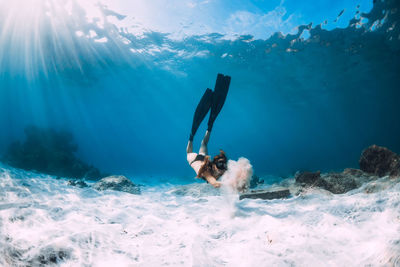 Man swimming in sea