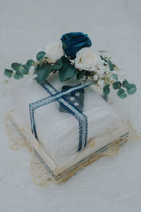 High angle view of white rose on table