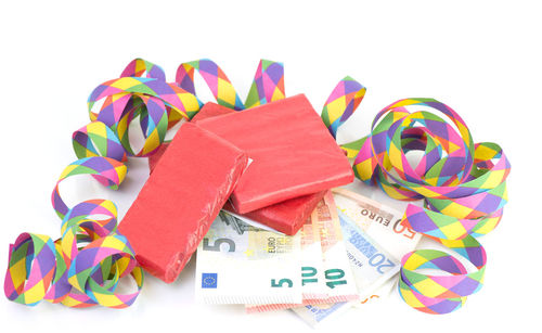 Close-up of multi colored pencils over white background