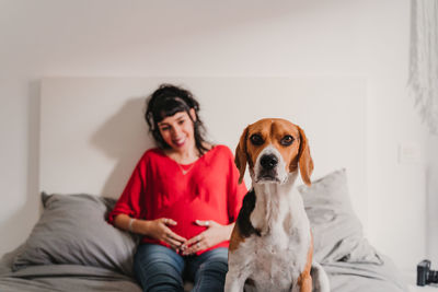 Portrait of dog sitting at home