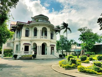 Facade of historic building against sky