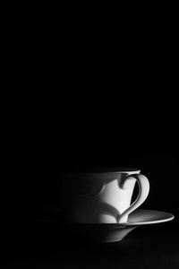 Close-up of coffee cup on table