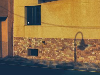 Shadow of window on wall of building