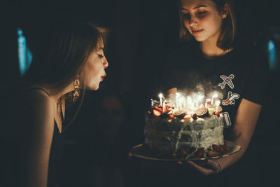 Birthday cake in dark room