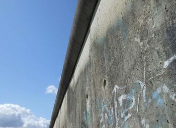 Low angle view of built structure against blue sky