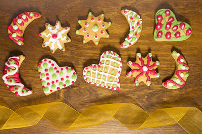 Directly above shot of colorful christmas cookies on table