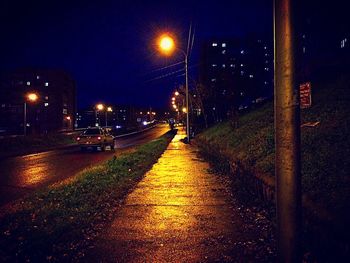 Illuminated street at night