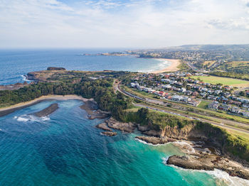 High angle view of swimming pool by sea against sky